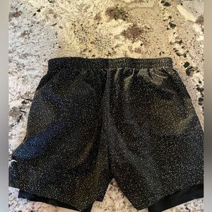 Zyia men’s black shorts with stretch lining. Grade for working out or jogging.